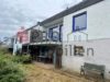 Freistehendes Einfamilienhaus in ruhiger Lage - Rückansicht mit Terrasse